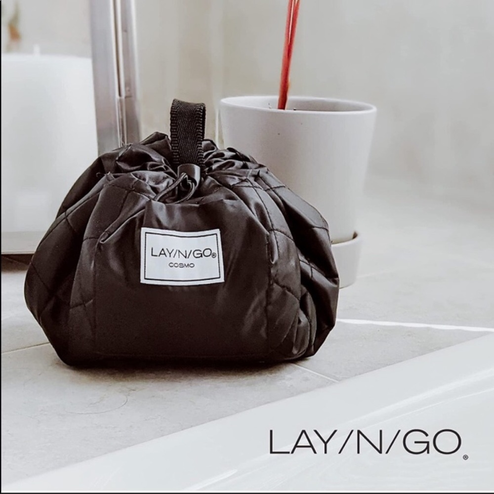 Lay N Go makeup bag with storage pouch champagne gold in color size 17”